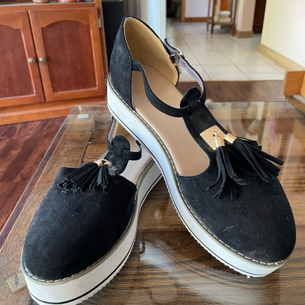 Black cutout platform loafers.  Size 9.